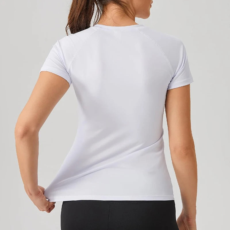Dame kompressions-t-shirt med korte ærmer, elastisk og hurtigtørrende, perfekt til træning og sport.