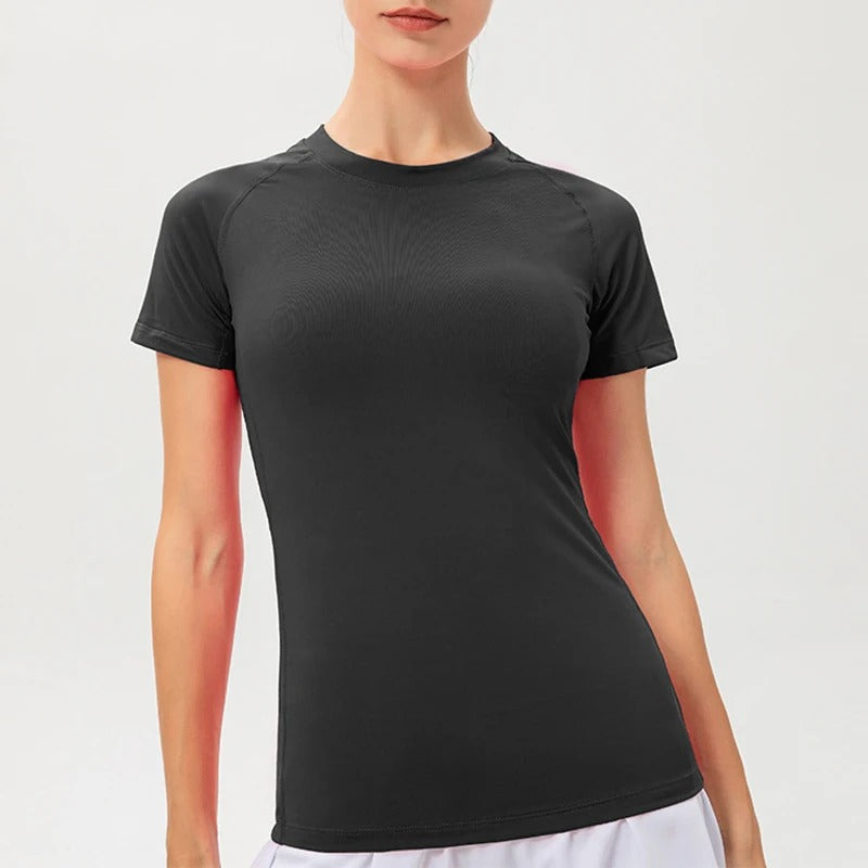 Dame kompressions-t-shirt med korte ærmer, elastisk og hurtigtørrende, perfekt til træning og sport.