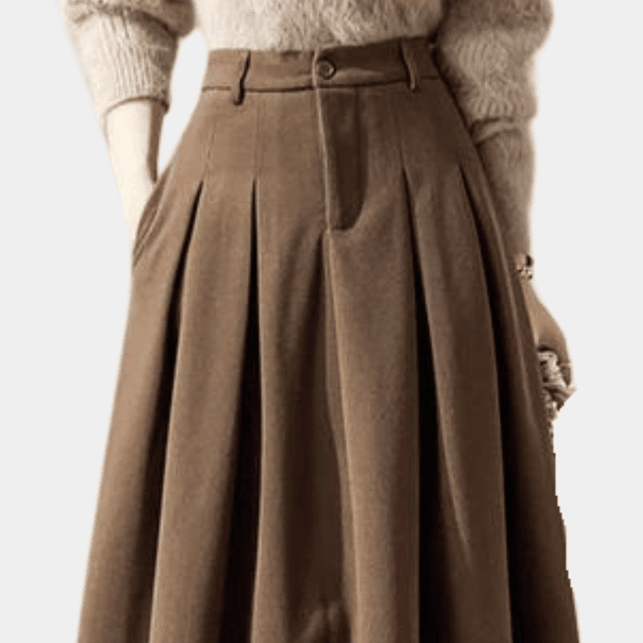 Dame metallic satin nederdel, klassisk snit, elegant glans, perfekt til fester og hverdagsbrug.