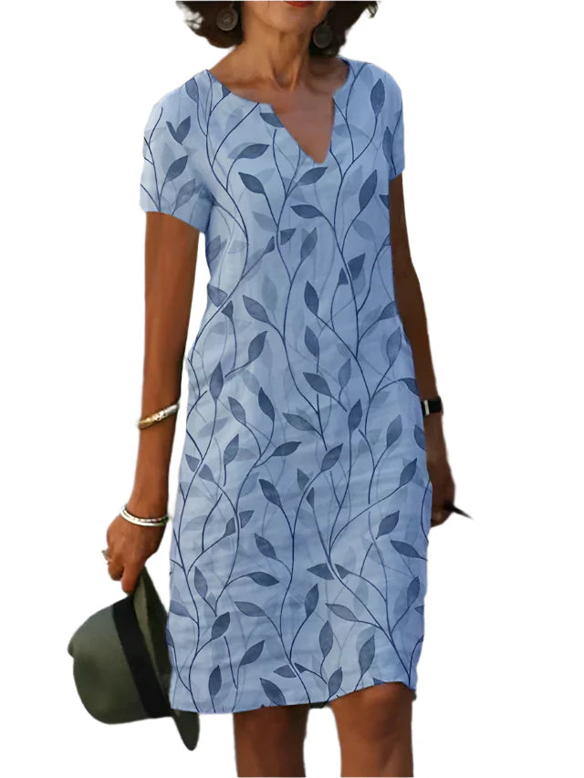 Dame midikjole, grøn-blå, V-udskæring, korte ærmer, elegant og behagelig sommerkjole.