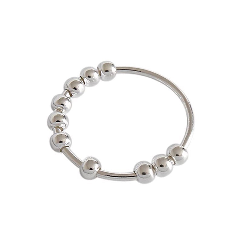 Dame beroligende ring, rosaguld, med roterende metalperler, elegant og beroligende, håndlavet smykketilbehør.