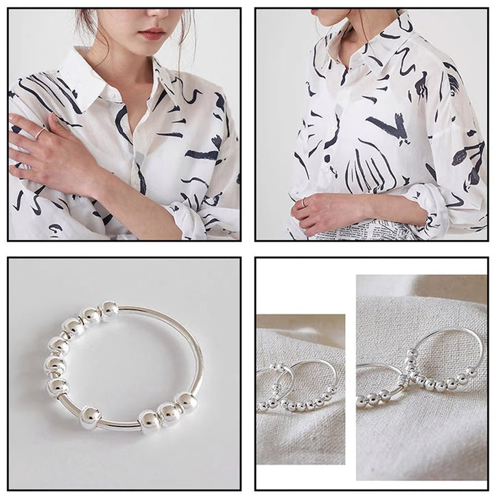 Dame beroligende ring, rosaguld, med roterende metalperler, elegant og beroligende, håndlavet smykketilbehør.