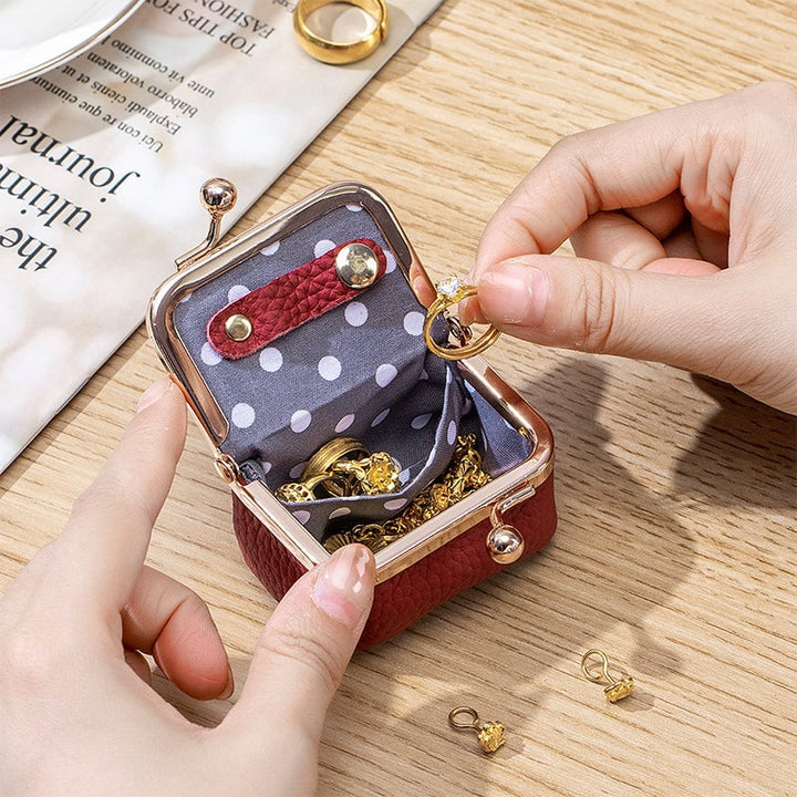 Dame miniskrin i ægte læder, retrostil, elegant og kompakt. Fås i flere farvemuligheder.