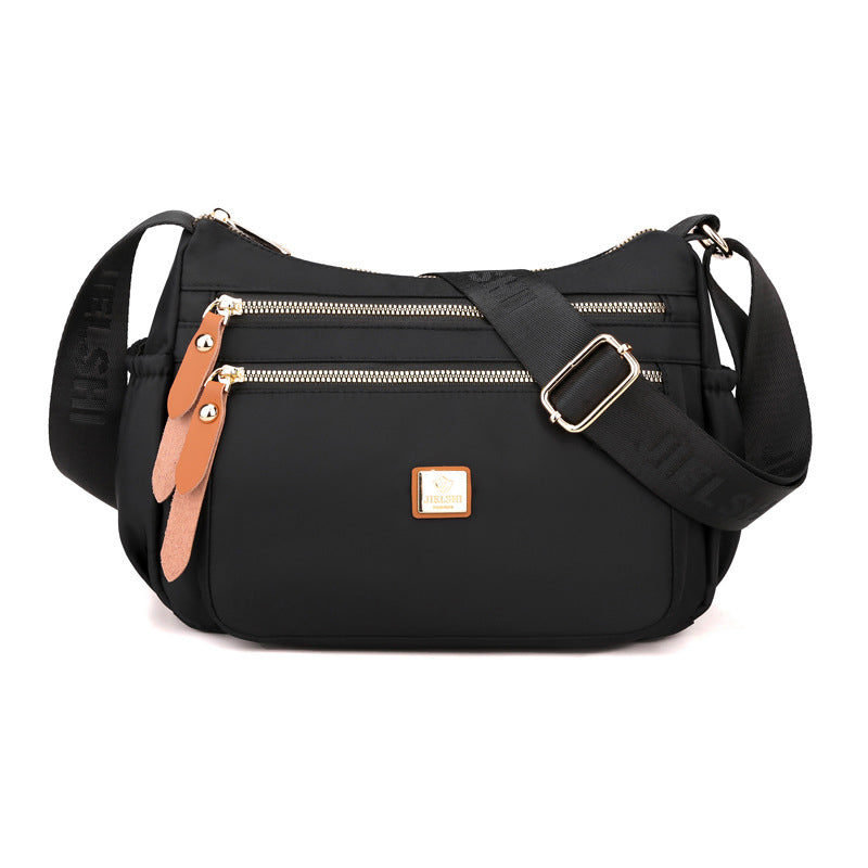Dame multi-lags nylon skuldertaske, grå, elegant og rummelig, flere lommer, perfekt til hverdagsbrug.