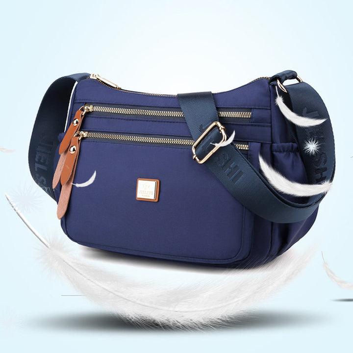 Dame multi-lags nylon skuldertaske, grå, elegant og rummelig, flere lommer, perfekt til hverdagsbrug.