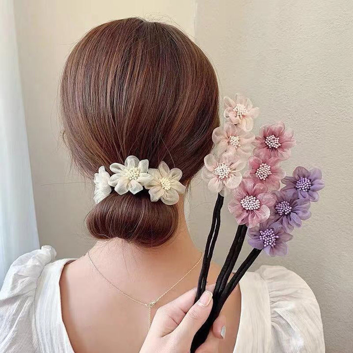 Dame multifarvet hårbånd med blomstermønster, hvid, lyserød, grå, lilla, elegant tilbehør.