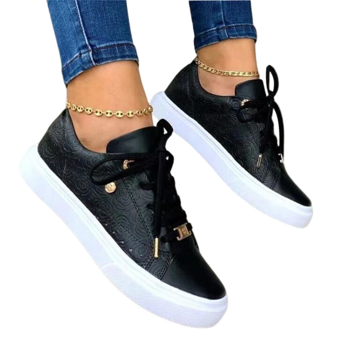 Naisten muodikkaat sneakerit keinonahalla, moderni design, kiiltävä pinta, pehmustettu sisäpuoli, monipuoliset värit.