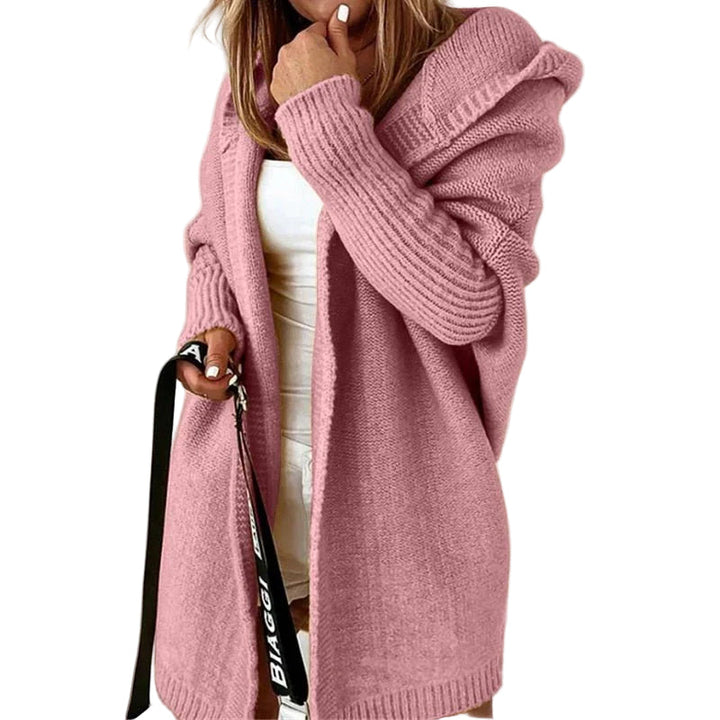 Naisten oversized villakangastakki huoodilla, beige, rento muotoilu, ribbireunat, ympäristöön ja tyyliin sopiva talviasu.