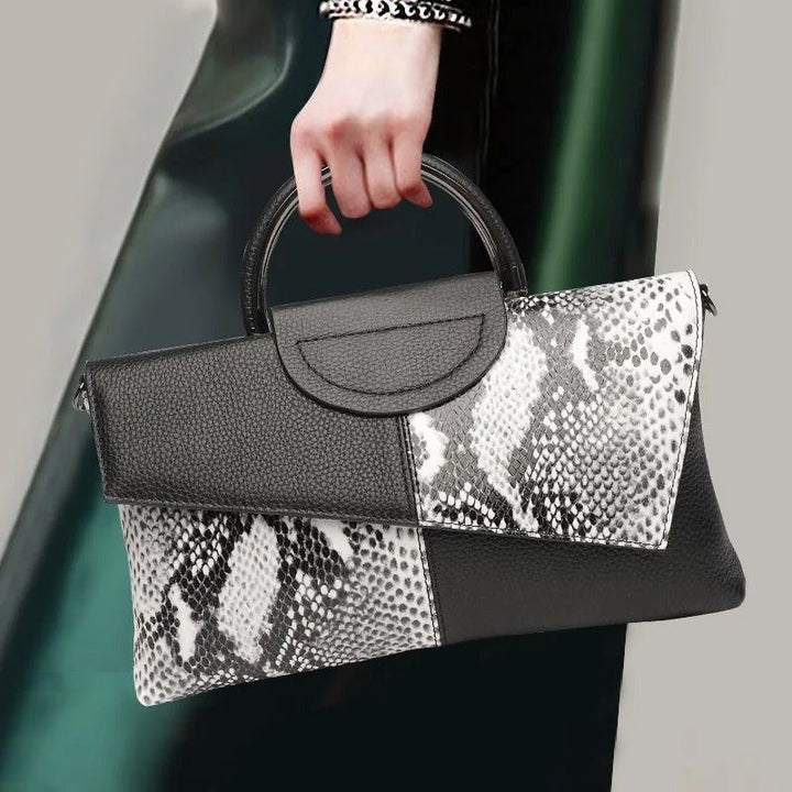 Dame crossbody håndtaske, minimalistisk design, pudderblød tone, krydset skulderrem