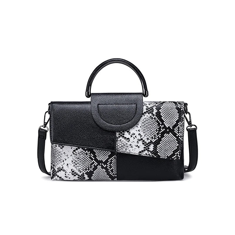 Dame crossbody håndtaske, minimalistisk design, pudderblød tone, krydset skulderrem