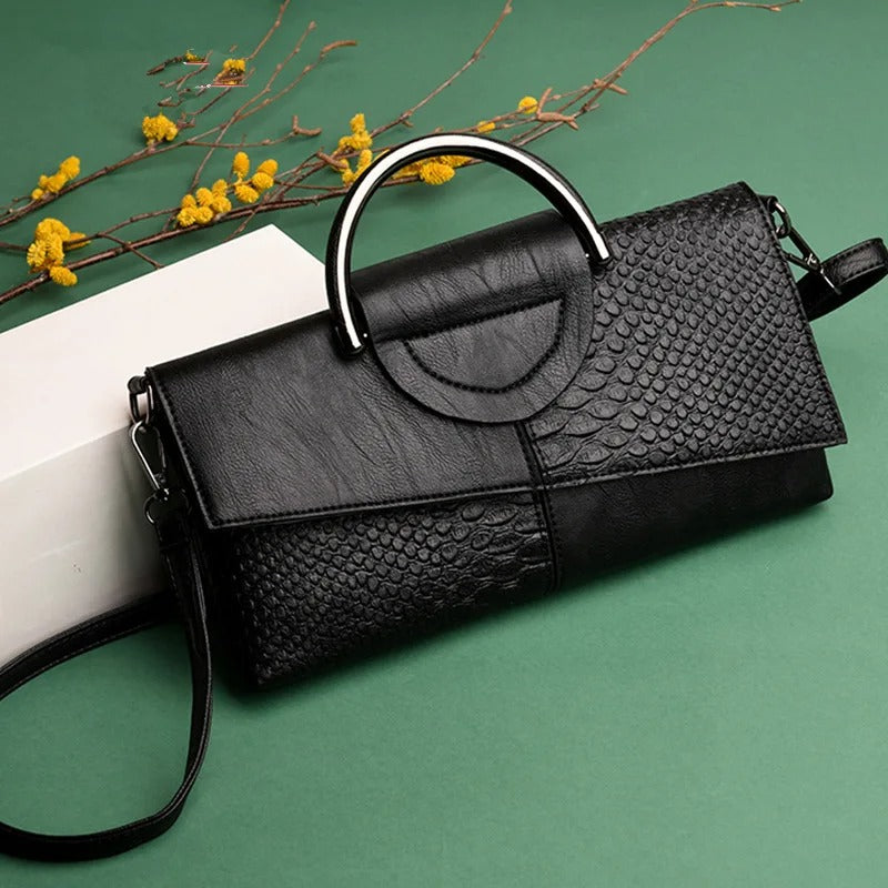 Dame crossbody håndtaske, minimalistisk design, pudderblød tone, krydset skulderrem