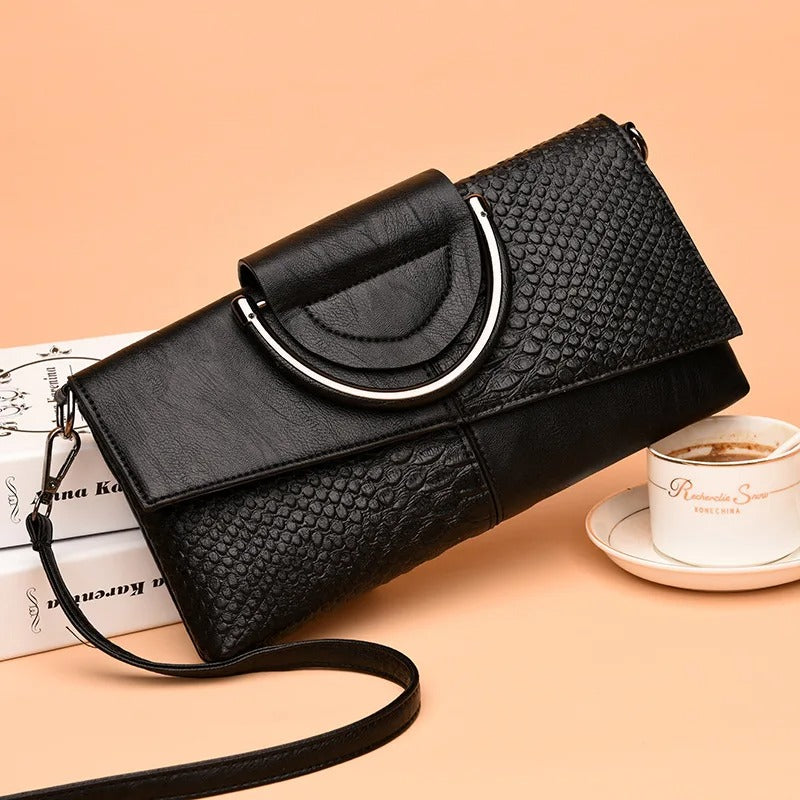 Dame crossbody håndtaske, minimalistisk design, pudderblød tone, krydset skulderrem
