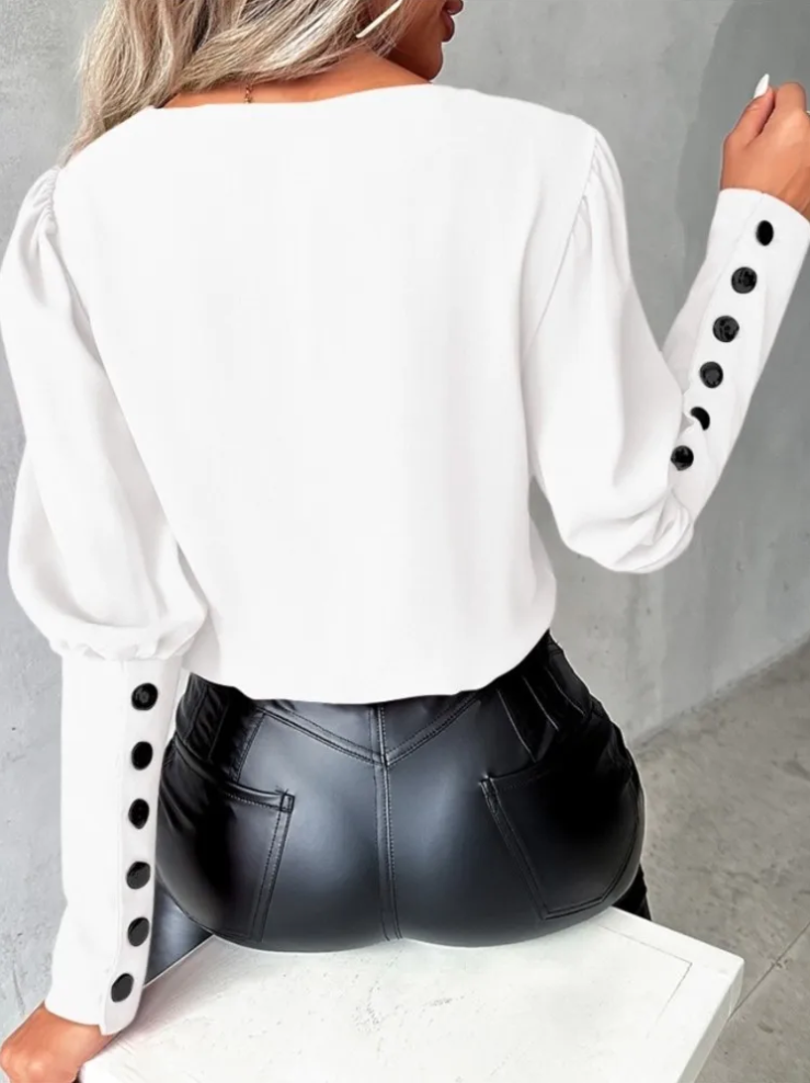 Damebluse med V-hals - elegant design, komfortabel pasform, alsidig til enhver lejlighed.