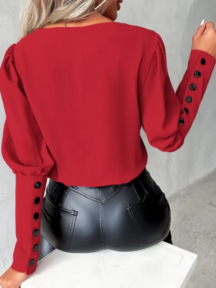 Damebluse med V-hals - elegant design, komfortabel pasform, alsidig til enhver lejlighed.