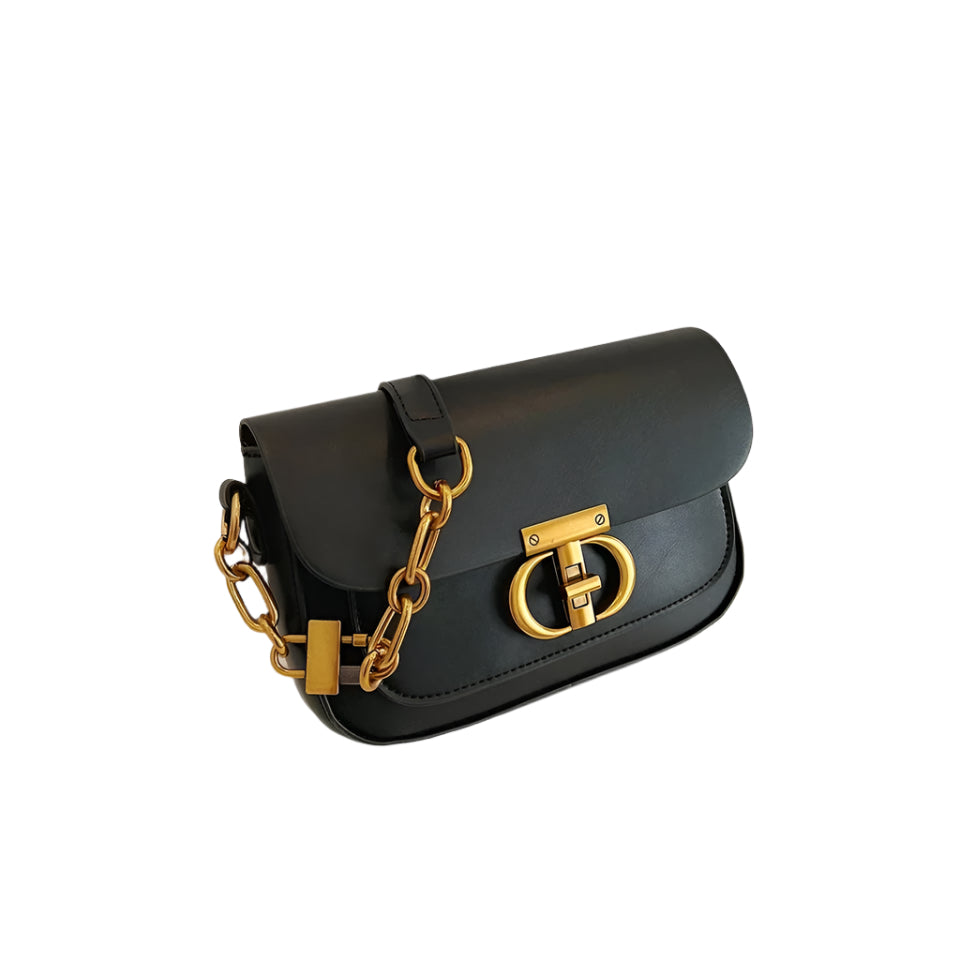 Dame crossbody taske, sort og brun, minimalistisk design, justerbar rem, kompakt størrelse.
