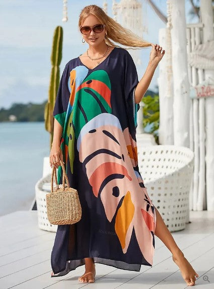 Dame lang boho kjole med regnbueprint, farverig og stilfuld, lang kant, perfekt til hverdag og fest.