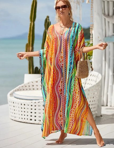 Dame lang boho kjole med regnbueprint, farverig og stilfuld, lang kant, perfekt til hverdag og fest.
