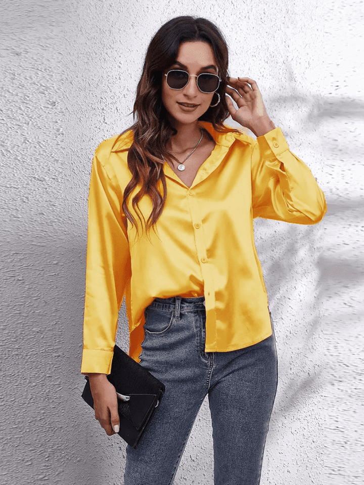 Dame langærmet bluse i satinlook, fås i flere farver, til et luksuriøst og elegant look.