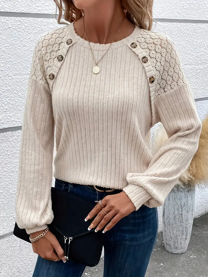Dame langærmet t-shirt med rund hals; blødt materiale, tidløst design, velegnet til hverdagsbrug.