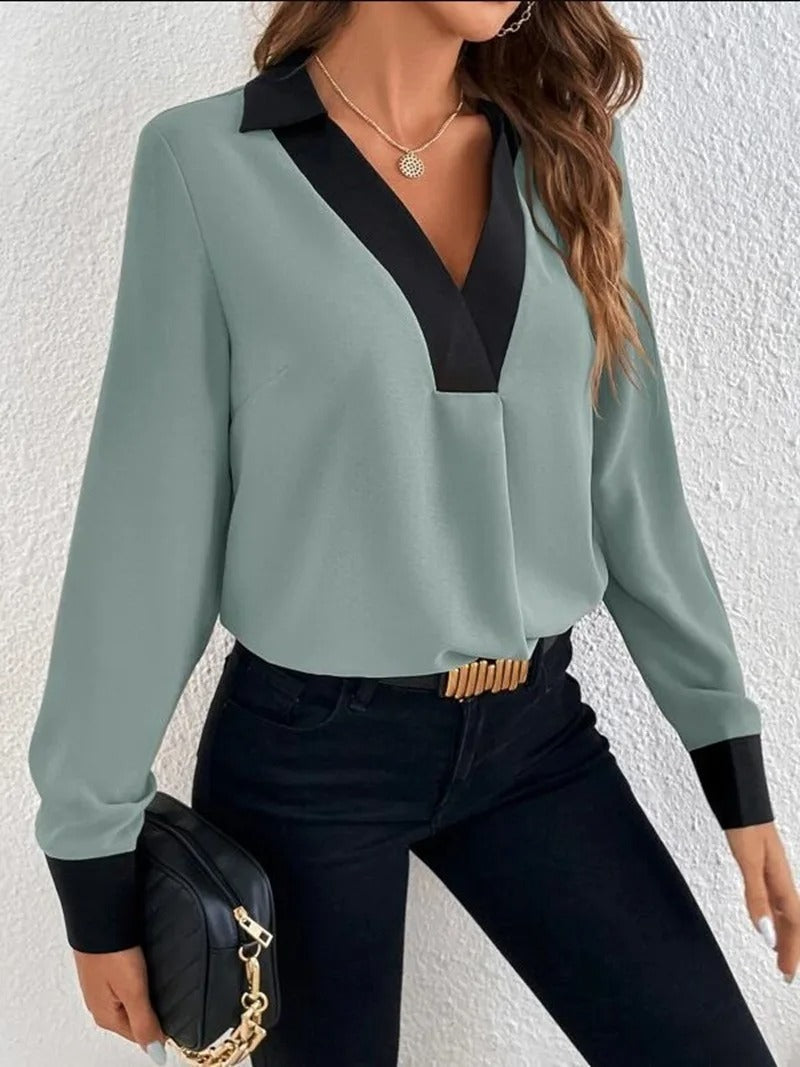 Dame langærmet kontorbluse med et elegant udseende og behagelig pasform.