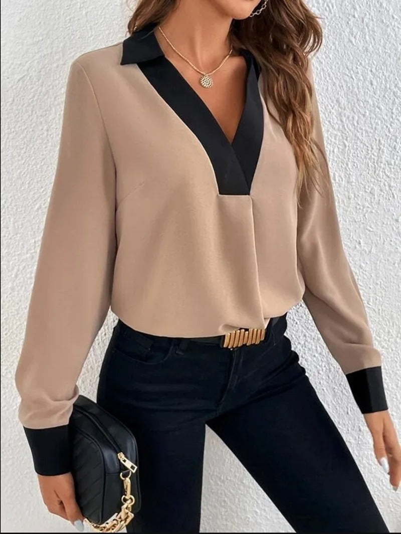 Dame langærmet kontorbluse med et elegant udseende og behagelig pasform.