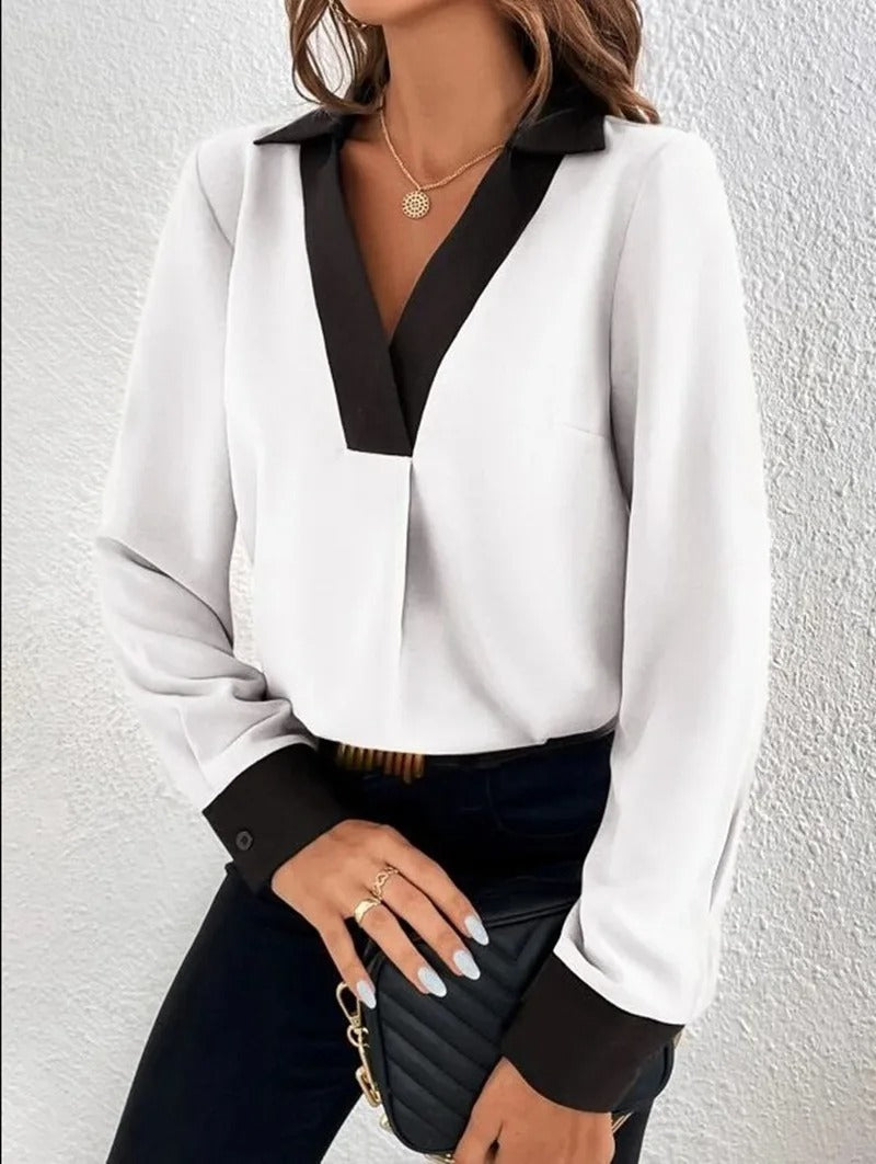Dame langærmet kontorbluse med et elegant udseende og behagelig pasform.