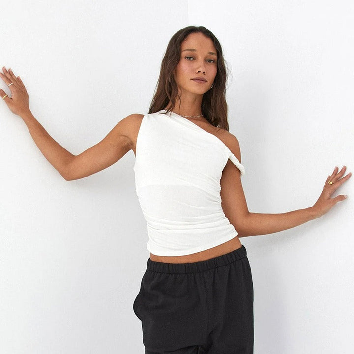 Dame off-shoulder crop top med blonder, hvid, sommerligt design, perfekt til højtaljede underdele.