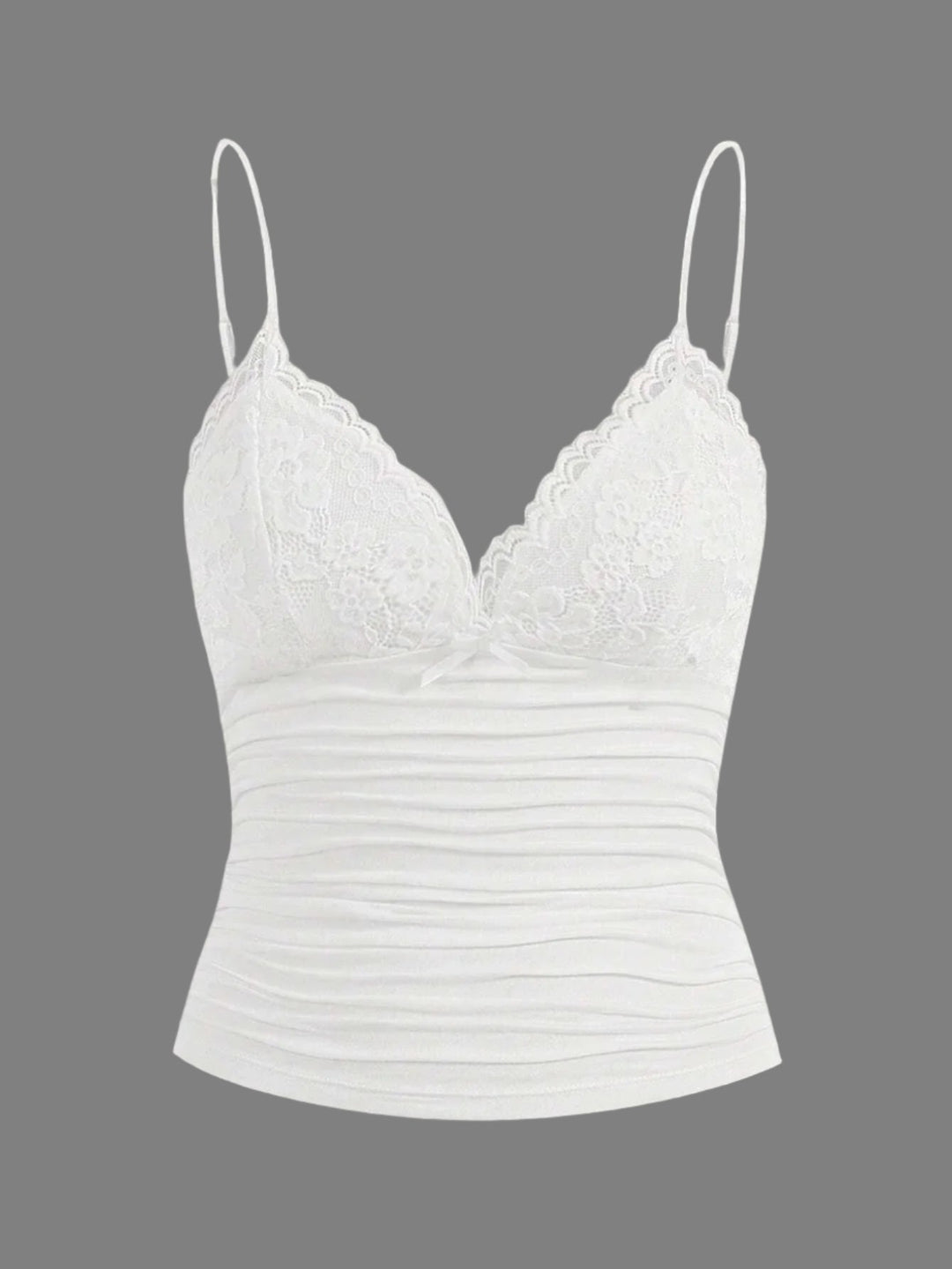 Dame kort top med blondekant og sløjfe. Let, justerbare stropper, perfekt til sommerlook.