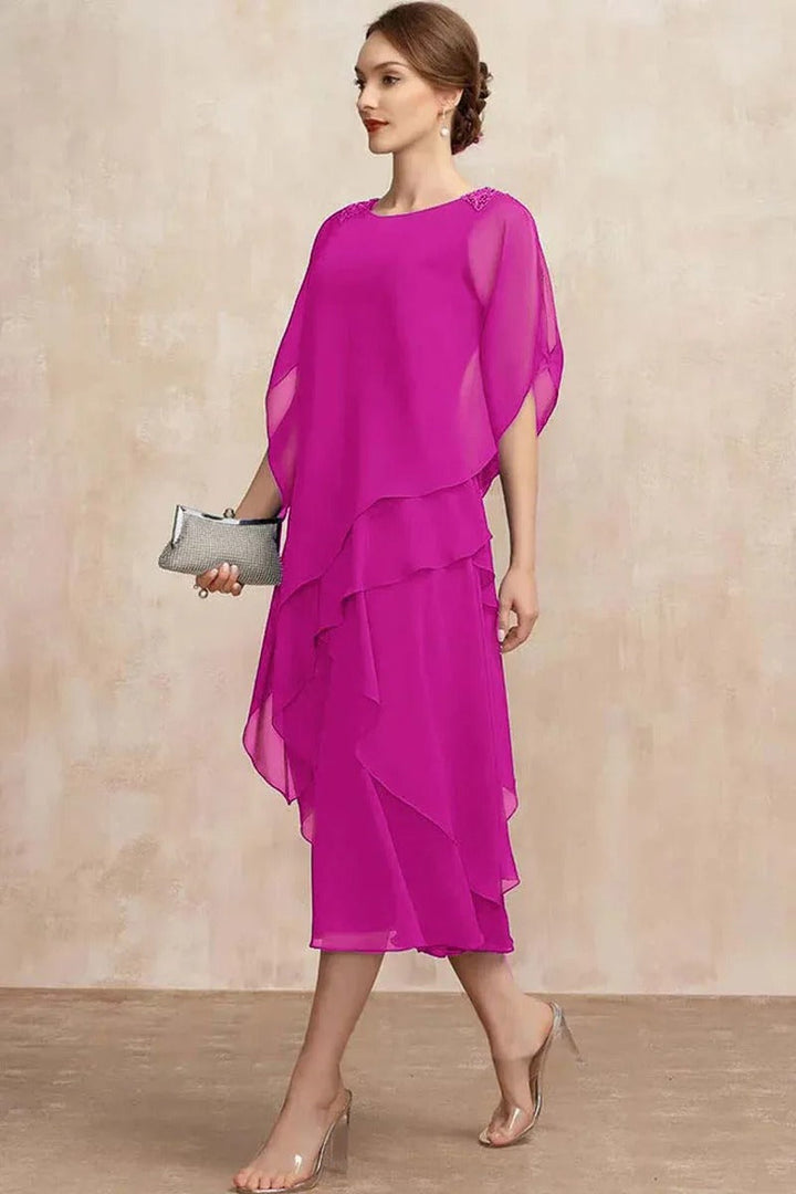 Dame plus size chiffon kjole med lagdelt kant og kronbladsærmer, elegant og let, fotograferet forfra.