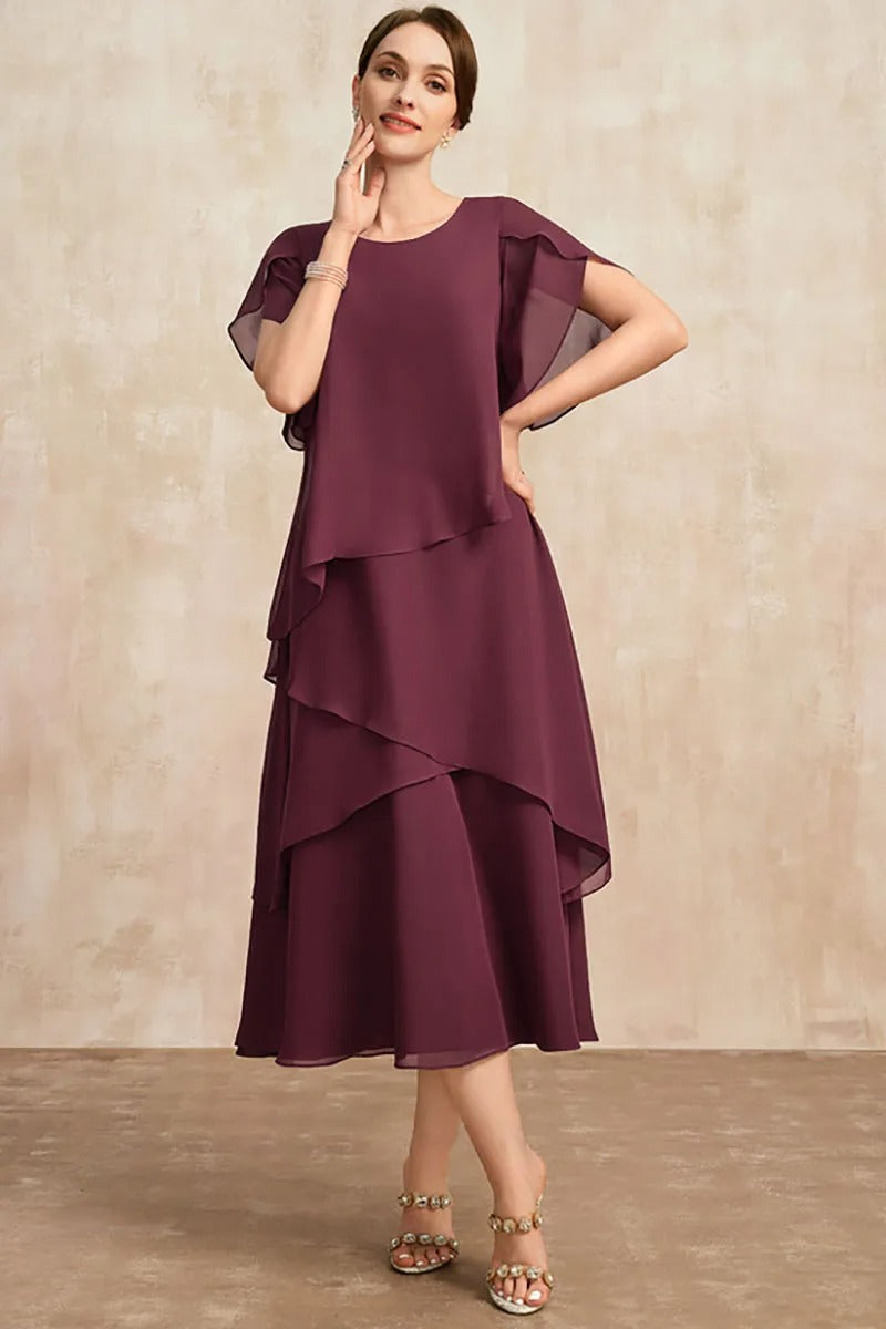 Dame plus size chiffon kjole med lagdelt kant og kronbladsærmer, elegant og let, fotograferet forfra.