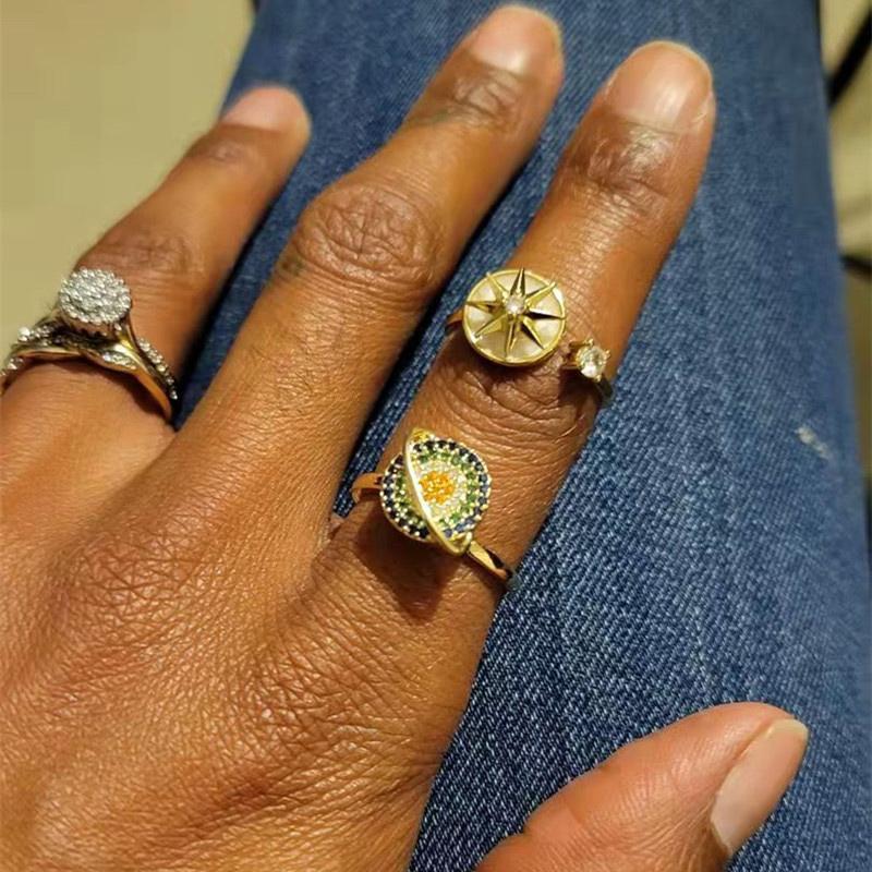 Dame roterende galakse ring, metallegering, sølvfarvet, lindrer angst og fremmer mental beroligelse.