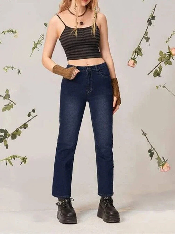 Dame stribet crop top med spaghetti stropper, knapper foran, let og åndbart materiale, egnet til sommerstil.