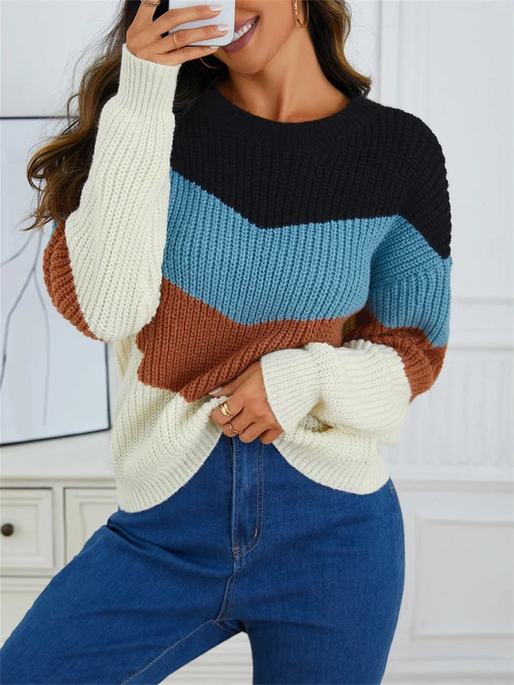 Dame stribet sweater med rund hals, flerfarvede striber, elegant og behagelig.