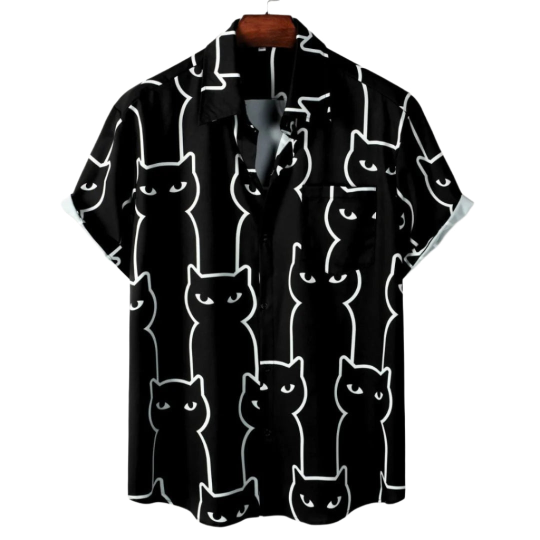 Dame afslappet sort t-shirt med katteprint, let og åndbart stof, farverigt katteprint foran, stilfuldt look.