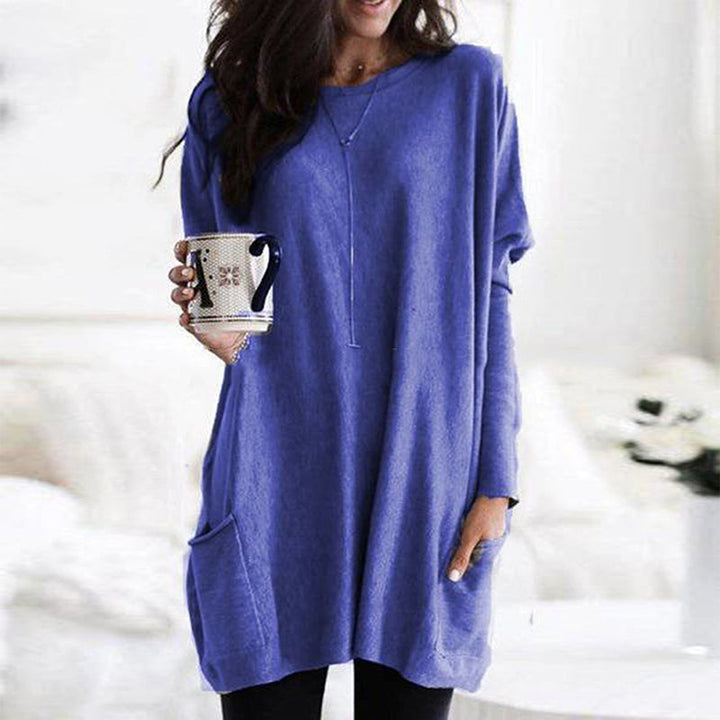Dame afslappet langærmet pullover, blødt stof, forlommer, stilfuldt look, fotograferet forfra, velegnet til hverdag og fritid.