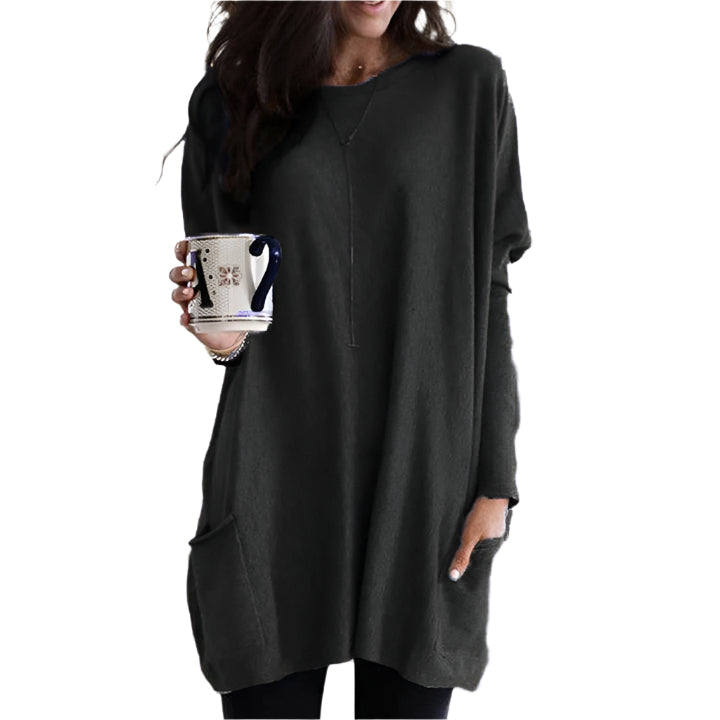 Dame afslappet langærmet pullover, blødt stof, forlommer, stilfuldt look, fotograferet forfra, velegnet til hverdag og fritid.