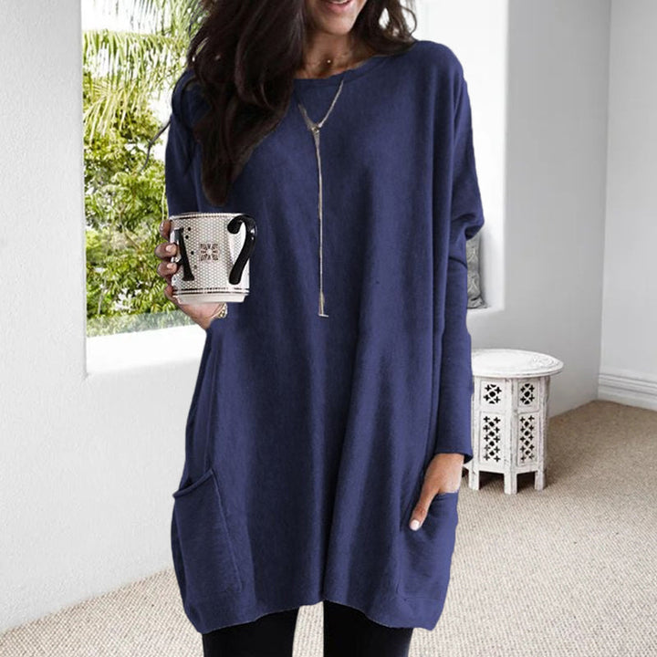 Dame afslappet langærmet pullover, blødt stof, forlommer, stilfuldt look, fotograferet forfra, velegnet til hverdag og fritid.