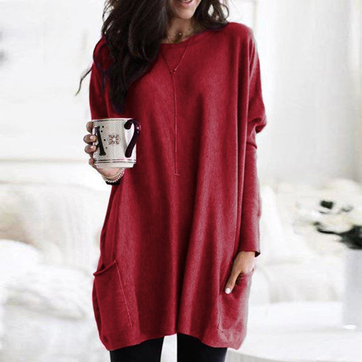 Dame afslappet langærmet pullover, blødt stof, forlommer, stilfuldt look, fotograferet forfra, velegnet til hverdag og fritid.