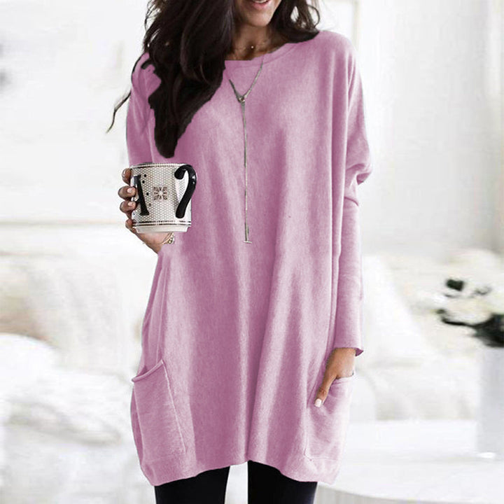Dame afslappet langærmet pullover, blødt stof, forlommer, stilfuldt look, fotograferet forfra, velegnet til hverdag og fritid.