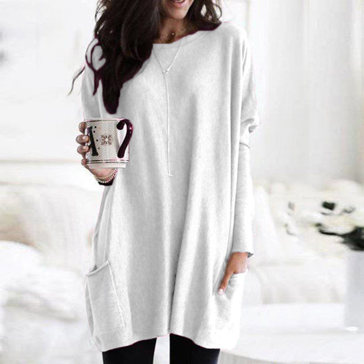 Dame afslappet langærmet pullover, blødt stof, forlommer, stilfuldt look, fotograferet forfra, velegnet til hverdag og fritid.