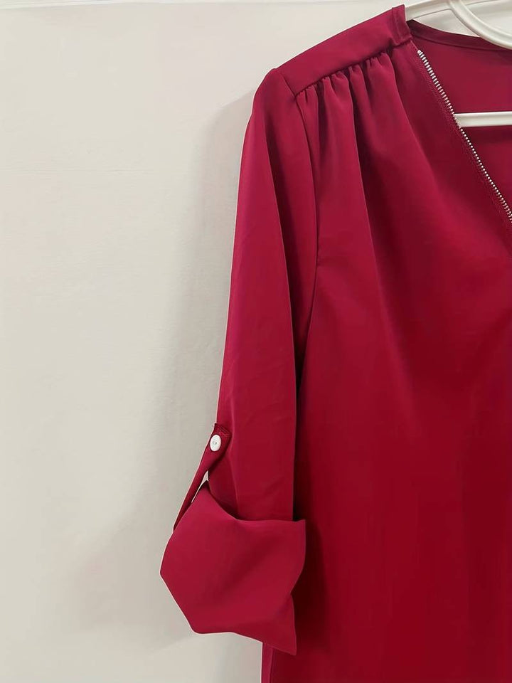 Dame afslappet bluse, rullekrave, halv lynlås, forfra, lysegrøn, komfortabelt og åndbart design.