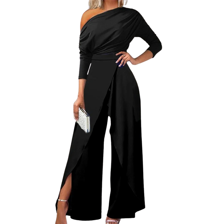 Dame jumpsuit med rynker, vide ben og cold shoulder i blå, elegant og moderne til forår/sommer.