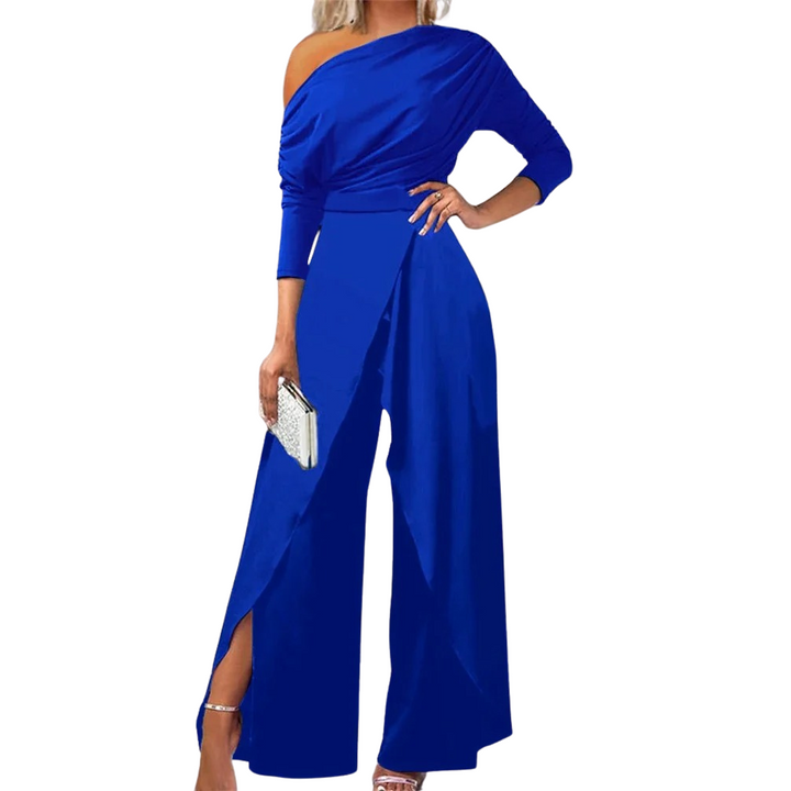 Dame jumpsuit med rynker, vide ben og cold shoulder i blå, elegant og moderne til forår/sommer.