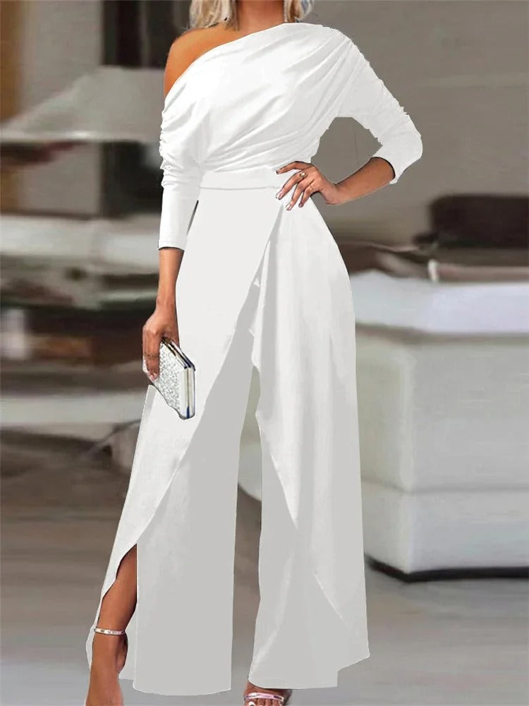 Dame jumpsuit med rynker, vide ben og cold shoulder i blå, elegant og moderne til forår/sommer.
