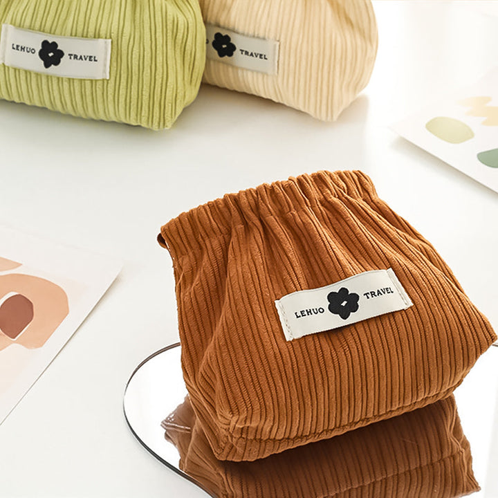 Dame brun corduroy elastisk hårsløjfe organizer, opbevar hårsløjfer stilfuldt og organiseret på farten.