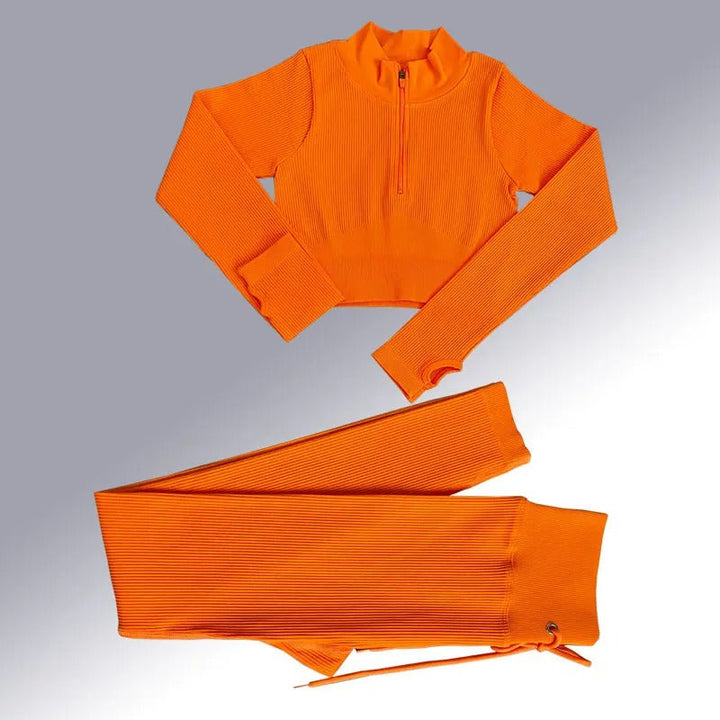 Dame sømløst yogasæt til træning; højtaljede leggings, langærmet crop top, elastisk og åndbar.