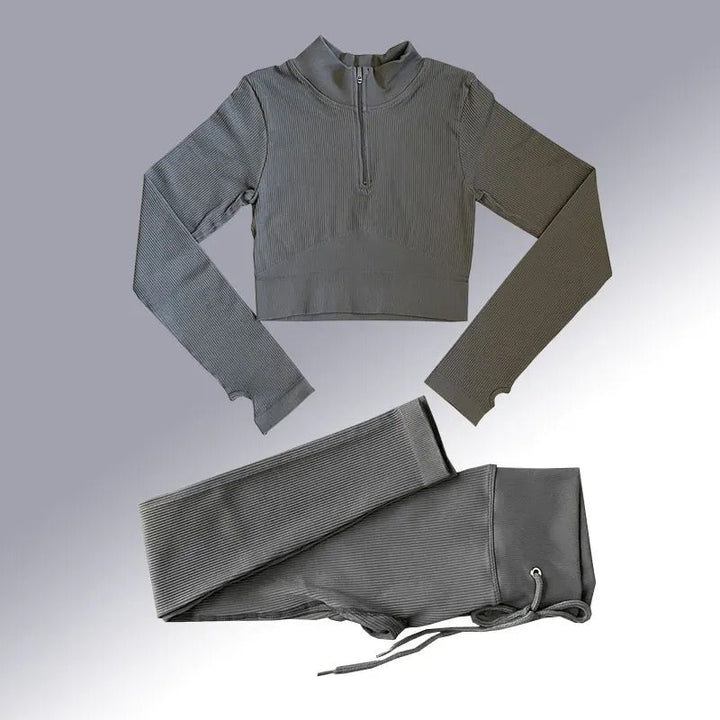 Dame sømløst yogasæt til træning; højtaljede leggings, langærmet crop top, elastisk og åndbar.
