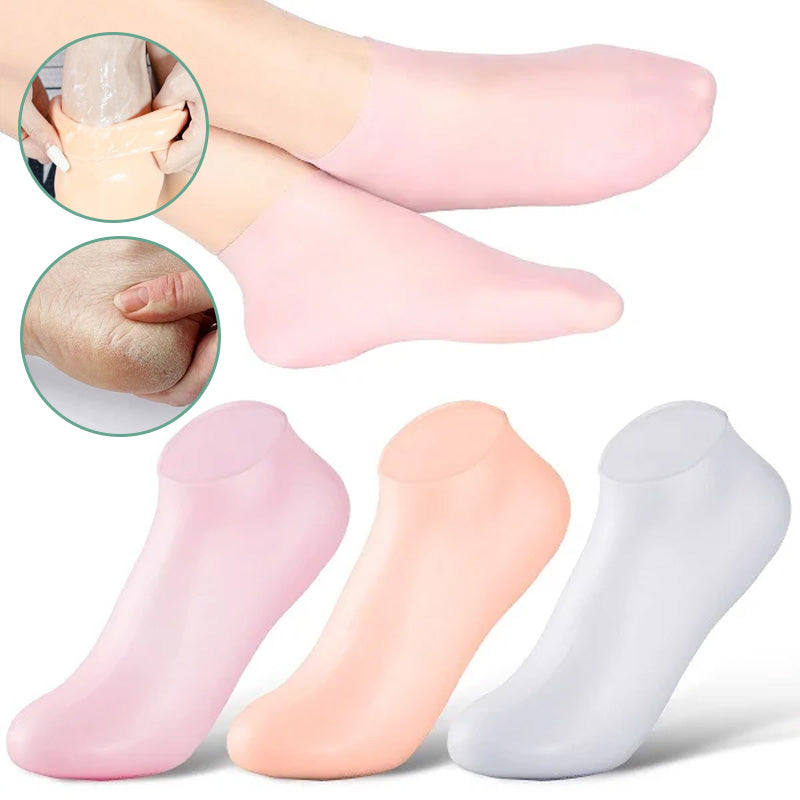 Kvinde silikonesokker med fugtgivende gel, lyserød, blød og fleksibel til spa-pedicure til hjemmebrug.