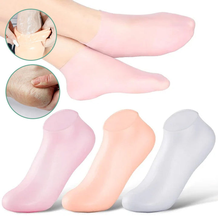 Kvinde silikonesokker med fugtgivende gel, lyserød, blød og fleksibel til spa-pedicure til hjemmebrug.