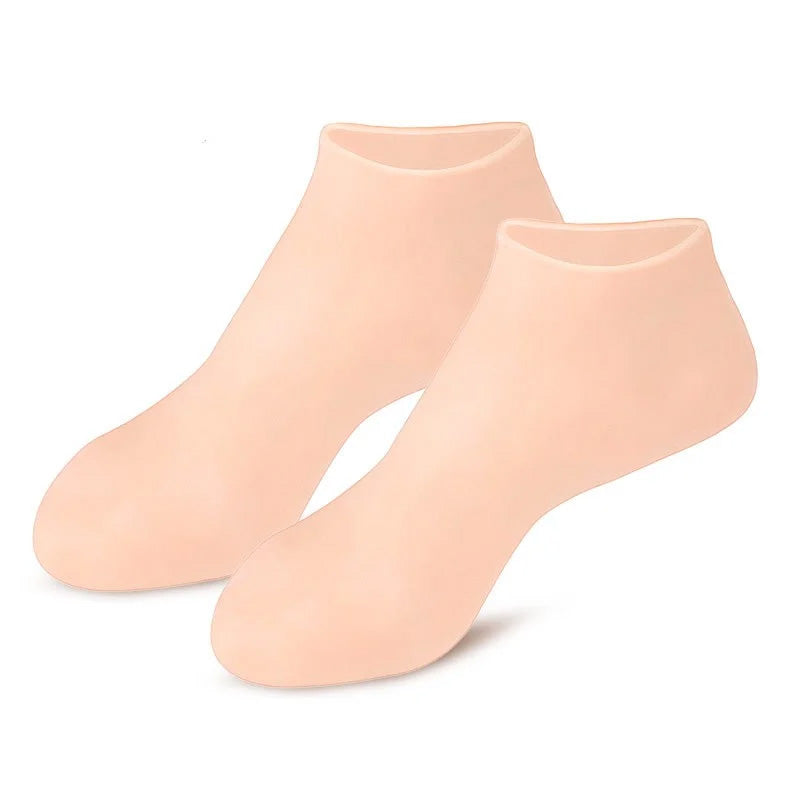 Kvinde silikonesokker med fugtgivende gel, lyserød, blød og fleksibel til spa-pedicure til hjemmebrug.